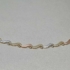 Kép 3/3 - Arany nyakék hullám mintával, gyémánt véséssel